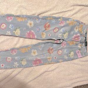 Blue jeans with floral pattern